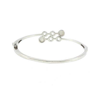 Silver Bangle Bracelet with Round Rubies and Geometric Design