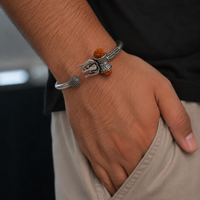 Silver Trishul and Damaru Bracelet with Red Coral