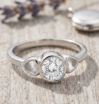 Silver Bezel Ring with Heart Motifs